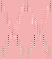 Vertical rows of vector red, gray spots with a white outline create rhombuses on a pink background.