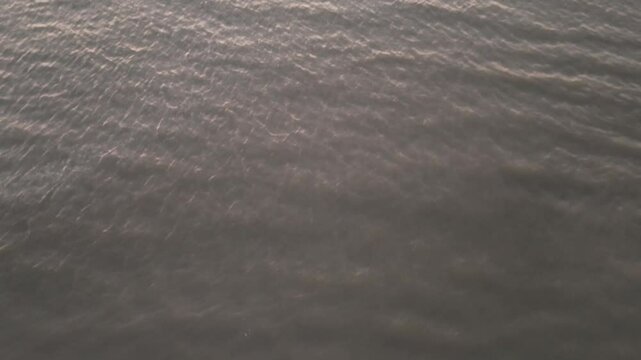 Horizon Glow: Sunset Over the Calm Sea