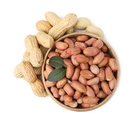 Fresh peanuts and bowl isolated on white, top view
