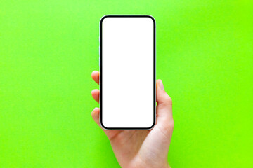 Empty mobile phone's screen, mockup on green background