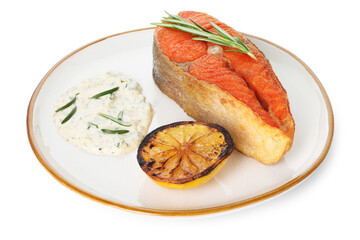 Seafood. Tasty salmon steak, sauce, lemon and rosemary isolated on white