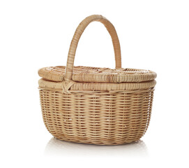 Fototapeta premium One empty wicker basket isolated on white