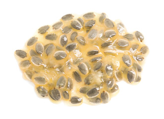 Passion fruit seeds isolated on white, top view
