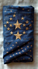 Folded historical flag with embroidered stars