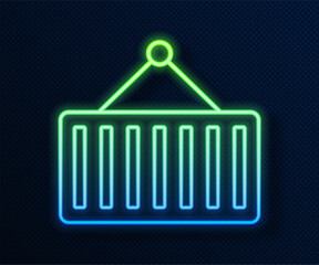 Glowing neon line Container on crane icon isolated on blue background. Crane lifts a container with cargo. Vector