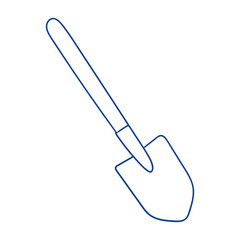 Shovel resting on the ground in a garden during early morning light