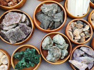 various kinds of spices on wooden background