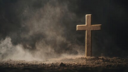 Bright cross made of aged wood radiating golden sacred light in mist