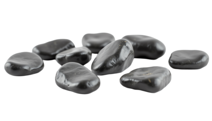 Shiny black pebbles arranged artistically.