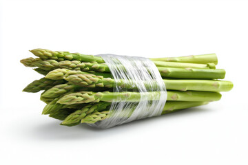 Packaged asparagus spears in plastic wrap fresh produce display kitchen environment close-up view culinary concept for healthy eating