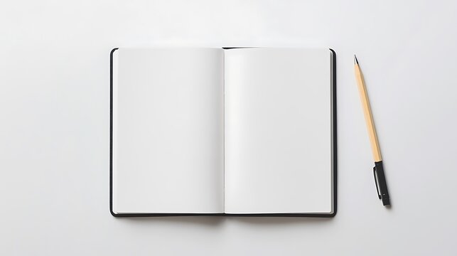 Open notebook with blank pages and pencil on white background.