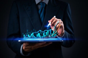 Business analytics with digital graph and growth chart on tablet for data visualization and financial technology with arrow trend and stock market.