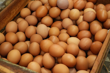 Brown Eggs in Wooden Crate
