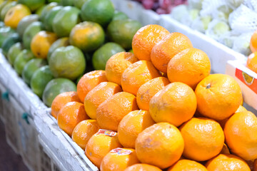 Tangerines at a Market, close up
