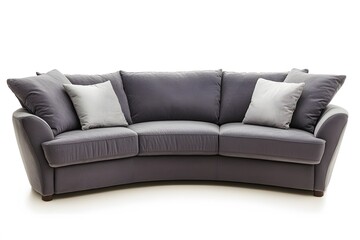 Obraz premium Modern curved gray sofa with pillows isolated on a white background for interior design