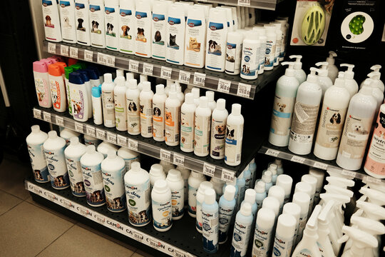 Belgrade, Serbia - May 7, 2025. Shelf with various dog shampoos and pet hygiene products inside Pet Centar, a popular pet store chain. Editorial image for pet care and retail.