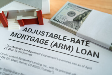 Adjustable-rate mortgage loan ready to sign. Concept of ARM loan to buy a house.