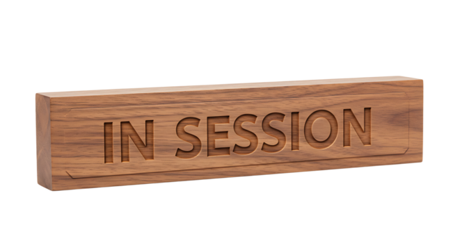 Carved wooden block displaying 'In Session' sign for professional office use