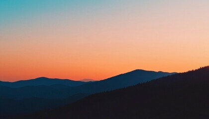 Obraz premium Sunset over mountain range