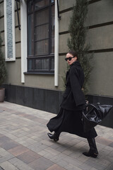 Street style fashion, professional model in stylish clothes.