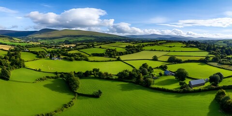 Breathtaking panoramic view of rolling green hills countryside landscape daytime aerial perspective