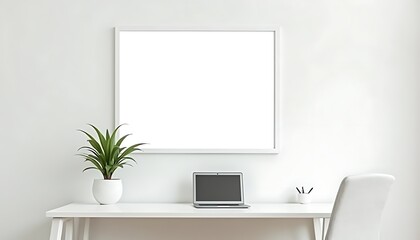 Obraz premium Minimalist workspace featuring a laptop plant and a blank frame against a white wall backdrop