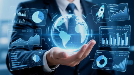 Businessperson displaying a digital globe with charts representing global business success and data analysis.