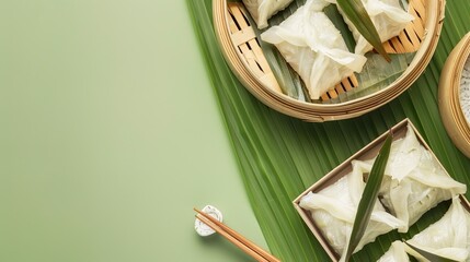Zongzi and Steamed Rice Dumplings on Green Table Background: Dragon Boat Festival Duanwu Concept, Close-Up, Copy Space, Top View, Flat Lay