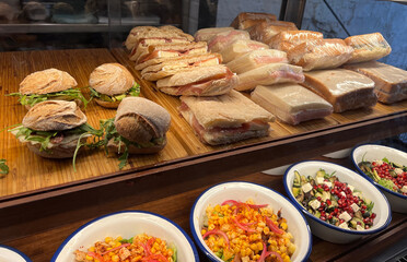 Variety of Sandwiches and Salads Displayed Delicious assortment ready for purchase in a cafe Bakery