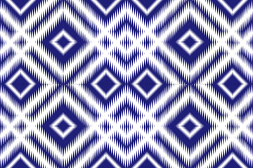 
A seamless colorful zigzag ikat pattern with vibrant red, green, yellow, black, and white tones. This traditional ethnic textile design features sharp jagged lines and a bold geometric layout, perfec