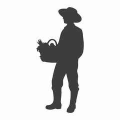 Silhouette of Farmer Carrying a Basket of Harvested Vegetables