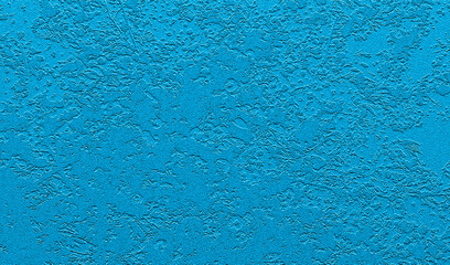 Blue background with raised botanical texture