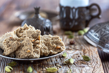 Fresh halva on a traditional bronze plate.