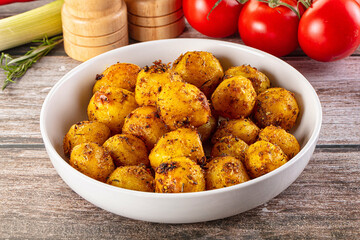 Baked small baby potato with herbs