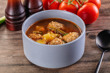 Tomato Soup with meatballs and vegetables