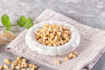 Cedar nut kernel in the bowl