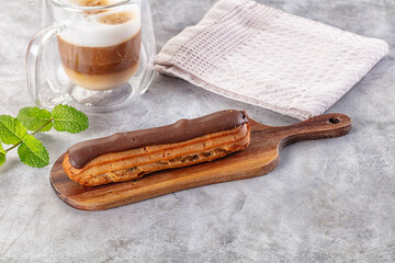 Gourmet chocolate eclair with icing
