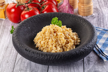 Vegan cuisine - boiled bulgur garnish