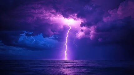 Obraz premium Dramatic lightning strike over the ocean. A powerful bolt of lightning illuminates a dark purple and blue stormy sky above a calm sea
