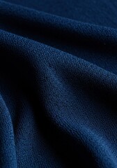 Fototapeta premium Navy blue fleece fabric texture, soft dark blue polyester material background, cozy warm textile folds for winter apparel and blankets
