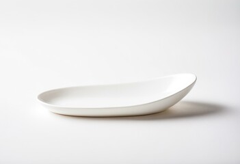 A white spoon sitting on top of a table.