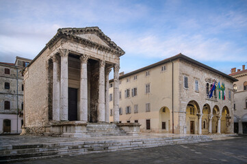 Fototapeta premium Ancient Temple of Augustus and City Hall in Pula, Croatia illustrate historical architecture and cultural heritage