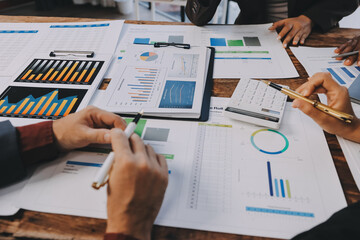 Business financing accounting banking concept. Business woman hand doing finances and calculate on desk about cost at home office. Woman working on desk with using calculator, finance accounting.