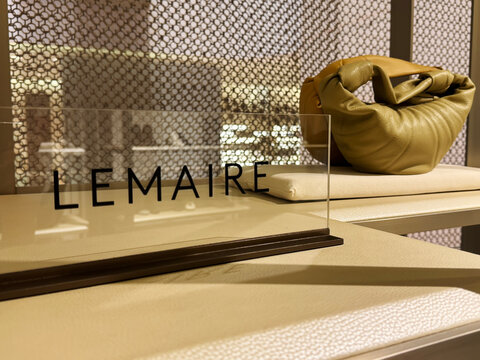 Shanghai,China-May 11th 2025: Lemaire brand logo and bag in store