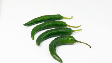 green chili peppers. fresh green chili pepper. a group of green chili and very fresh ingredients. sliced chili