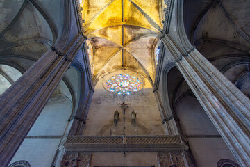 Interiors of Seville gothic cathedral in Andalusia, Spain