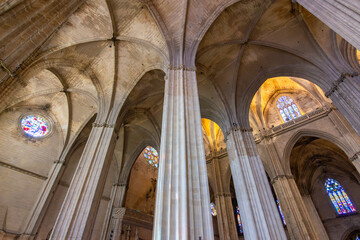 Interiors of Seville gothic cathedral in Andalusia, Spain