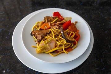 The most traditional yakisoba prepared with vegetables, noodles, pork and oriental spices.