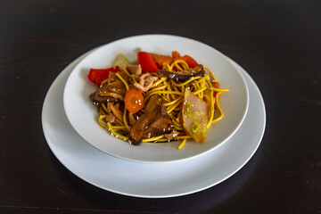 The most traditional yakisoba prepared with vegetables, noodles, pork and oriental spices.