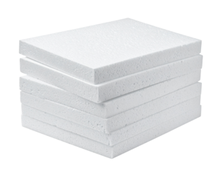 Stack of white foam boards arranged neatly in a pile.